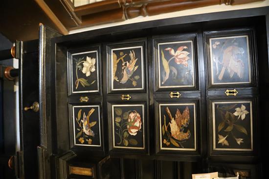 A 17th/18th century Italian and later pietra dura and ebony veneered cabinet on an ebonised wood stand, W.4ft 2in. D.1ft 7in. H.4ft 6.5